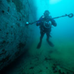 Diver exploring a shipwreck