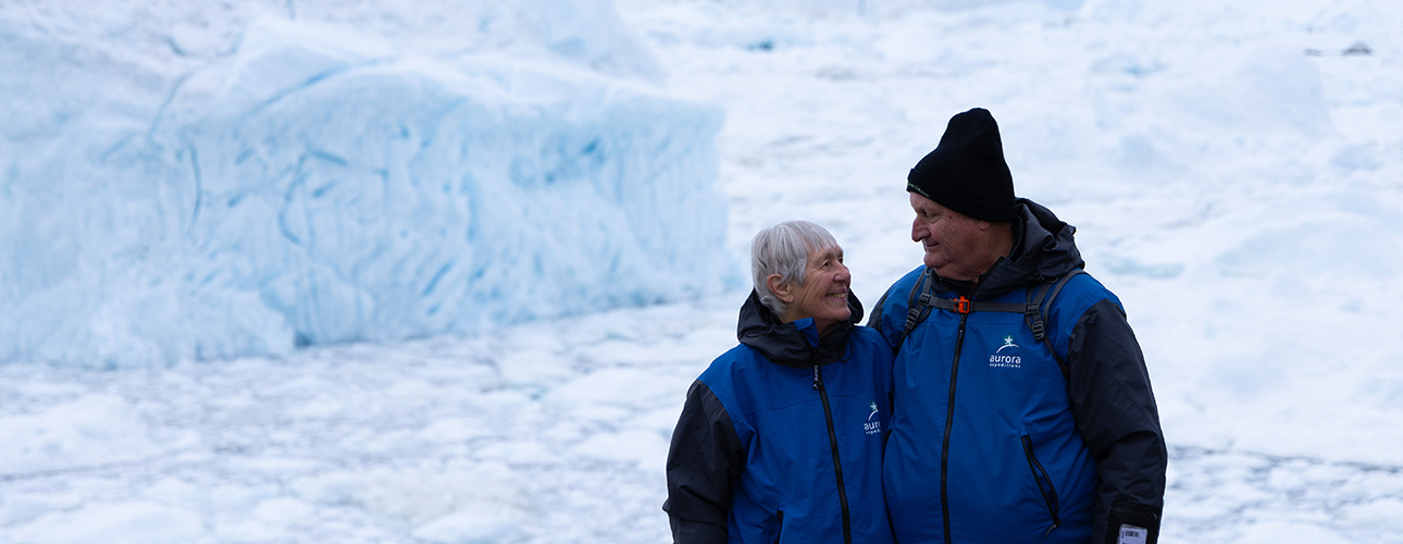 Couple Smiling in Ilulissat, Greenland, Natalie Long
