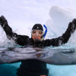 Sylvia Earle snorkeling in the Arctic by Michael Aw
