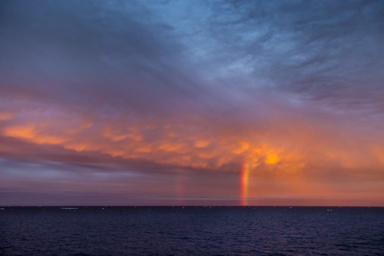Rainbow at sunrise over the Franklin Strait in Canada's High Arctic